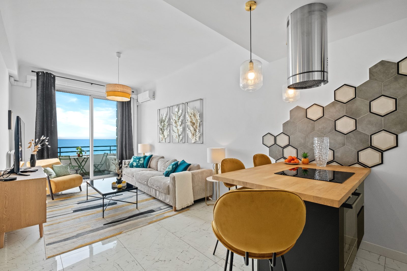 Open-plan living and dining with sea view