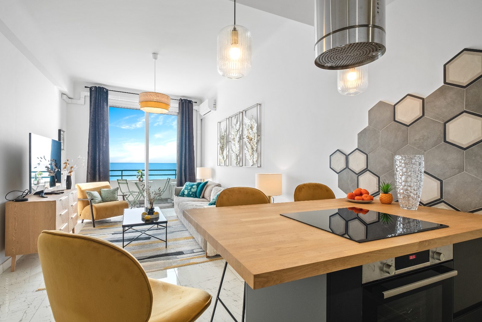 Dining island seating four, living room beyond